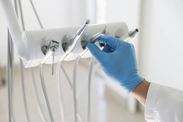 Professional Tooth Extraction technician working in Dover, FL